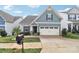 Attractive home with a manicured lawn, complemented by beautiful landscaping at 50143 Robins Nest Ln, Lancaster, SC 29720