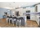This kitchen has stainless appliances, a large island with bar seating, and is adjacent to the dining area at 50143 Robins Nest Ln, Lancaster, SC 29720