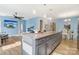 A great kitchen island offers lots of storage space and bar seating. The living room and dining room are nearby at 50143 Robins Nest Ln, Lancaster, SC 29720