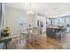 Charming kitchen featuring a dining area, island, and stainless steel appliances at 50143 Robins Nest Ln, Lancaster, SC 29720
