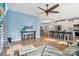 Open-concept layout with kitchen view, highlighted by modern furnishings and hardwood floors at 50143 Robins Nest Ln, Lancaster, SC 29720