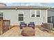 Exterior patio features seating area with comfortable chairs and fire pit at 50143 Robins Nest Ln, Lancaster, SC 29720