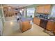 Spacious kitchen with island flows into the living room, perfect for entertaining at 514 Galesburg Dr, Monroe, NC 28110