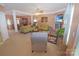 Sun-filled living room with stylish furnishings and adjacent dining area at 514 Galesburg Dr, Monroe, NC 28110