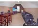 Spacious living room with plush sofa, TV, table and chairs at 514 Galesburg Dr, Monroe, NC 28110