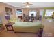 Inviting living room featuring a fireplace, ceiling fan, and comfortable seating, creating a warm ambiance at 514 Galesburg Dr, Monroe, NC 28110