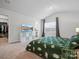 Inviting bedroom with carpet, a window with curtains, storage, a comfortable bed, and ample natural light for a peaceful retreat at 709 Daniel Ln, Richburg, SC 29729