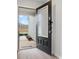 An open front door showcasing an electronic keypad and the view of the front yard at 709 Daniel Ln, Richburg, SC 29729
