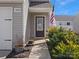 A close-up of the front door with the house number and an American flag on display at 709 Daniel Ln, Richburg, SC 29729