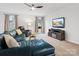 Inviting living room featuring a comfortable leather chair and a television with a fireplace at 709 Daniel Ln, Richburg, SC 29729