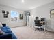 Home office with a large window, built-in shelving, and a dedicated workspace at 709 Daniel Ln, Richburg, SC 29729