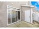 Back patio featuring sliding glass doors for an easy transition between indoor and outdoor spaces at 8263 Carob Tree Ln, Charlotte, NC 28215