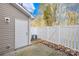 Cozy backyard featuring a privacy fence, perfect for relaxing or entertaining at 8263 Carob Tree Ln, Charlotte, NC 28215