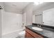 Bathroom featuring vanity with sink, walk-in shower and tub at 8309 Knapp Ct, Locust, NC 28097