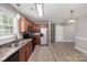 Well-lit kitchen featuring stainless steel appliances and lots of cabinet space at 8309 Knapp Ct, Locust, NC 28097