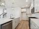 Well-lit kitchen with stainless steel appliances, center island, and stylish pendant lighting at 10113 Mamillion Dr, Huntersville, NC 28078