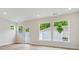 Bright living room featuring hardwood floors, recessed lighting, and large windows at 10113 Mamillion Dr, Huntersville, NC 28078