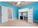 Blue bedroom featuring a lofted bed with a built in desk and ladder at 11604 Bradford Park Dr, Davidson, NC 28036