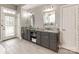 Main bathroom includes double vanities, soaking tub, and access to backyard at 123 Yellow Jacket Cir, Mooresville, NC 28117