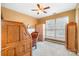 Cozy bedroom featuring a large window, wooden furniture, and comfortable carpeting, perfect for relaxation at 14414 Arbor Ridge Dr, Charlotte, NC 28273