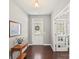 Welcoming foyer with dark hardwood floors, a console table, and natural light at 1760 Bailey Ridge Dr # 116, York, SC 29745