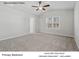 Comfortable primary bedroom featuring vaulted ceilings and a ceiling fan for added comfort at 213 Lake George Dr, Shelby, NC 28152