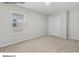 Bedroom with neutral carpet, double closet and window with white blinds at 213 Lake George Dr, Shelby, NC 28152