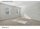 Bedroom features neutral carpet, two windows with natural light and white walls at 213 Lake George Dr, Shelby, NC 28152