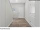 Welcoming foyer with modern flooring and a neutral color palette, creating a bright entry space at 213 Lake George Dr, Shelby, NC 28152