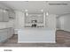 Modern kitchen featuring gray cabinets, granite countertops, and an island at 213 Lake George Dr, Shelby, NC 28152