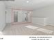 Spacious loft area featuring neutral carpet, two windows with natural light, and white walls at 213 Lake George Dr, Shelby, NC 28152