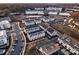 Aerial view of a modern townhouse community with well-maintained landscaping and ample parking at 2306 Elizabeth Mill Pl, Charlotte, NC 28208