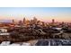 Expansive city skyline view with highways, trees, and building tops in foreground at 2306 Elizabeth Mill Pl, Charlotte, NC 28208
