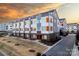Modern townhome exterior featuring rooftop terraces and contemporary architectural design at 2306 Elizabeth Mill Pl, Charlotte, NC 28208