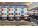 Modern townhome with a brick facade, gray siding, and rooftop decks under a partly cloudy sky at 2306 Elizabeth Mill Pl, Charlotte, NC 28208