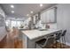 Open kitchen with granite counters, stainless steel appliances, and a view into the living area at 2306 Elizabeth Mill Pl, Charlotte, NC 28208