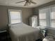 Bedroom with white trim, a window, and simple furnishings at 2318 W Main St, Albemarle, NC 28001
