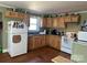 Charming kitchen featuring wood cabinets, countertops, and appliances at 2318 W Main St, Albemarle, NC 28001