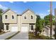Charming new construction townhomes featuring a neutral color palette, one car garage, and well manicured yard at 2825 New Pineola Rd # 7A, Charlotte, NC 28208