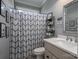 Bathroom featuring a large white vanity and decorative mirror at 329 Wintergreen Ct, Kings Mountain, NC 28086