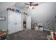Attic bedroom with carpeted floors and a toy box at 329 Wintergreen Ct, Kings Mountain, NC 28086