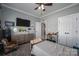Bedroom with grey carpet, tv, chair, and large window at 329 Wintergreen Ct, Kings Mountain, NC 28086