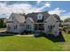 Beautiful one-story white brick home with a well-manicured lawn and inviting front entrance at 329 Wintergreen Ct, Kings Mountain, NC 28086