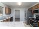 Bright kitchen with stainless steel appliances and a view to living area at 4175 Barnell Ln, Maiden, NC 28650