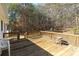 Backyard wooden deck with plenty of space, inviting relaxation and outdoor gatherings with scenic views at 4175 Barnell Ln, Maiden, NC 28650