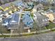 Aerial view of a blue home with a well-maintained yard and surrounding neighborhood at 431 Third Baxter St, Fort Mill, SC 29708