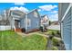 Spacious backyard with a patio set, lush green grass and black mulch at 431 Third Baxter St, Fort Mill, SC 29708