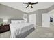 Bedroom with gray walls, plush carpeting, a ceiling fan, and natural light at 431 Third Baxter St, Fort Mill, SC 29708