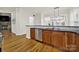 Modern kitchen with wooden cabinets, stainless steel appliances, and granite countertops at 431 Third Baxter St, Fort Mill, SC 29708
