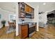 Efficient kitchenette with stainless steel appliances, granite countertops, and wood cabinetry at 431 Third Baxter St, Fort Mill, SC 29708
